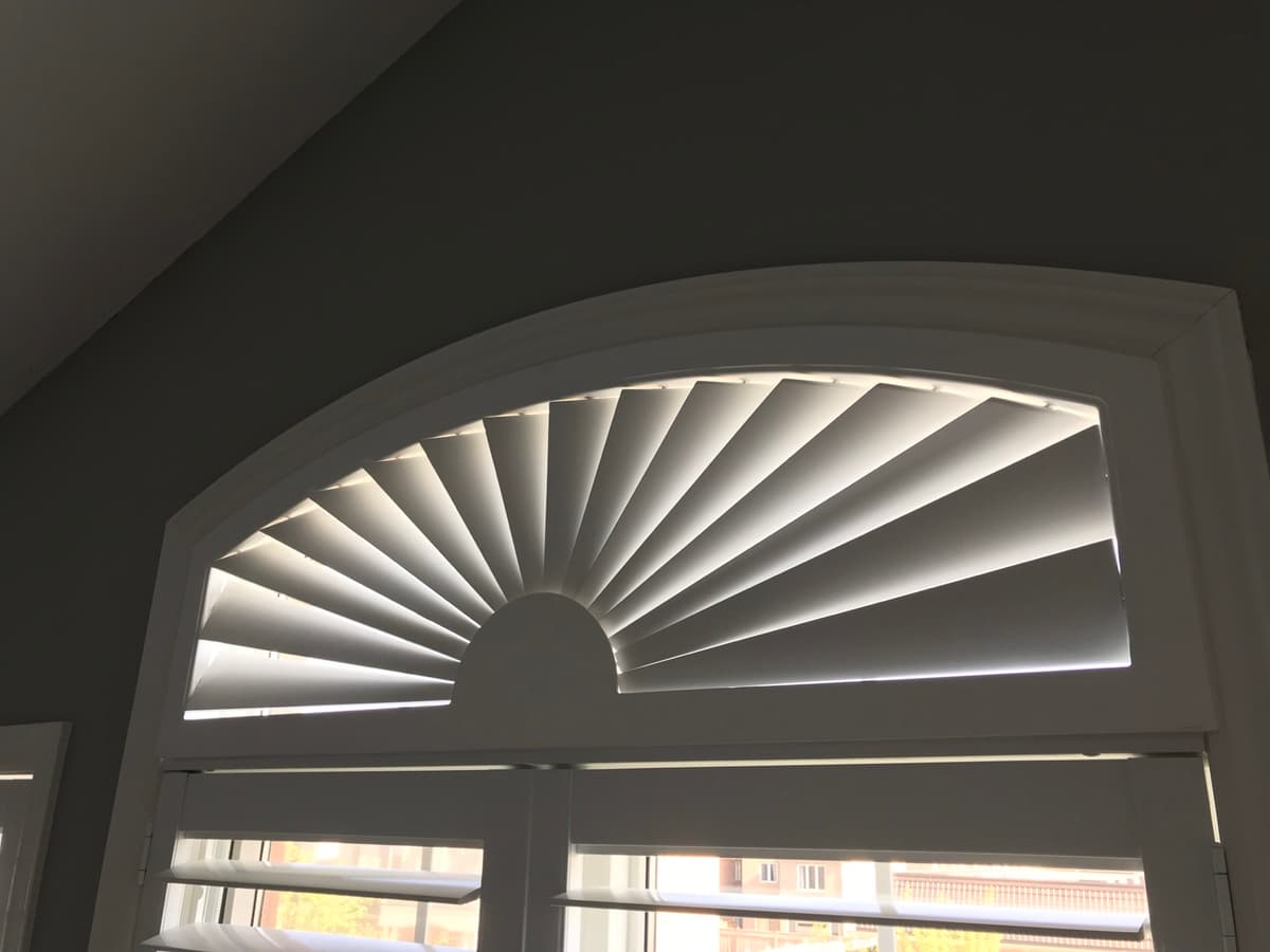 Custom California shutters on large window - Toronto home