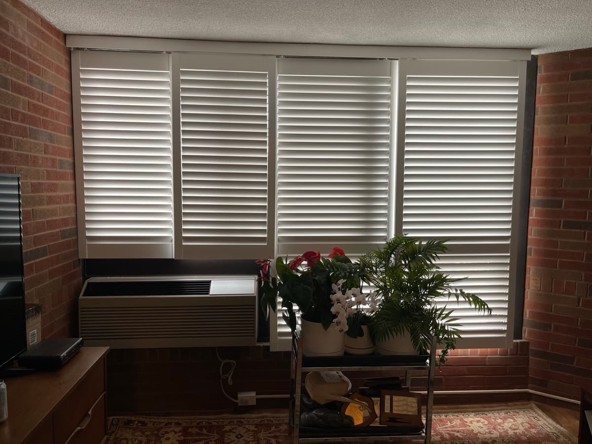 2.5 inch louver California shutters in bedroom - Canadian Shutters