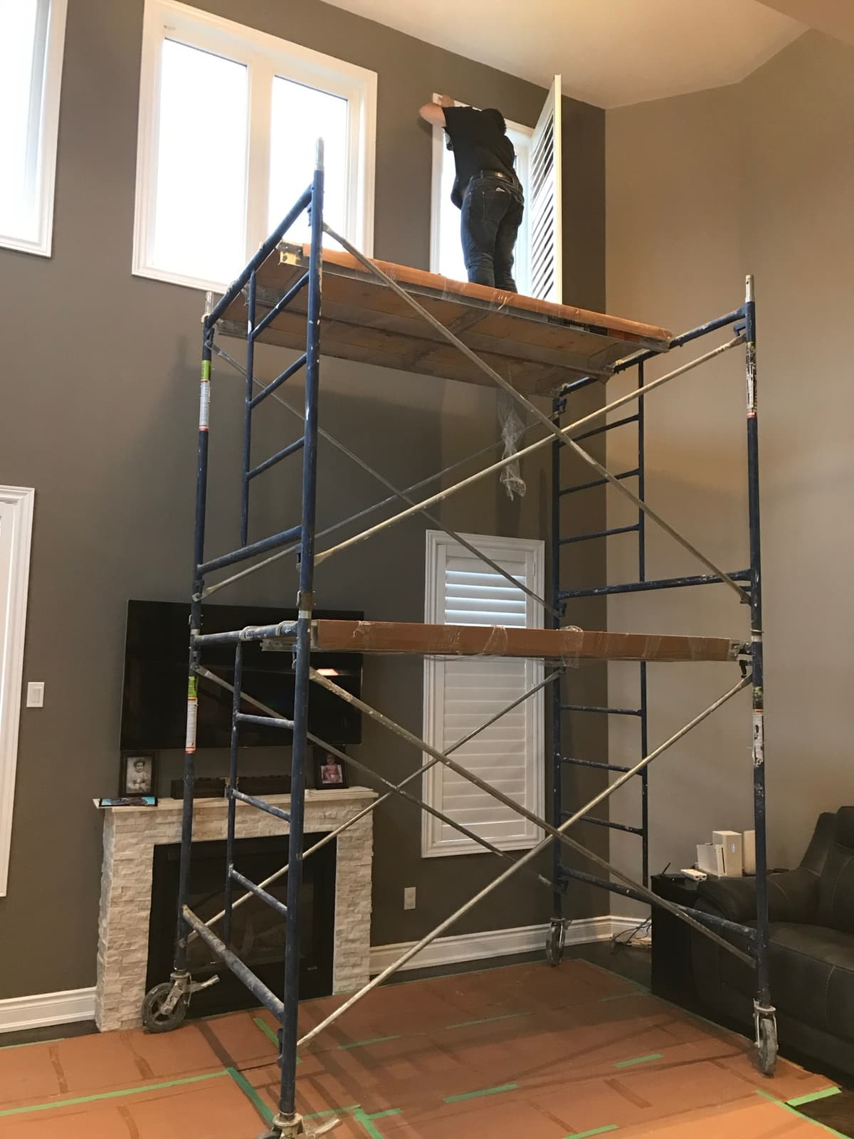 Custom fitted California shutters in family room - Canadian Shutters