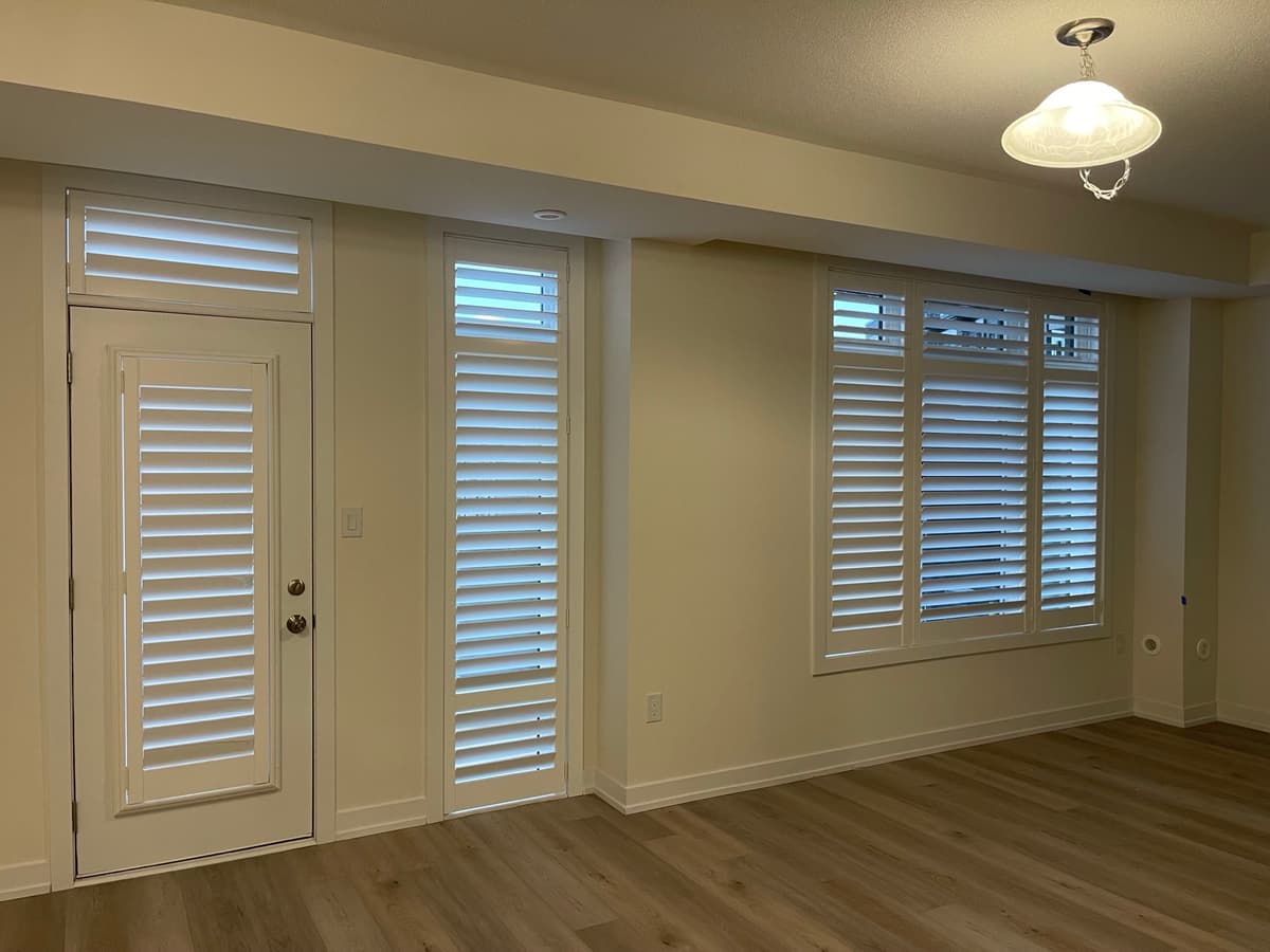California shutters on multiple windows - Toronto residence