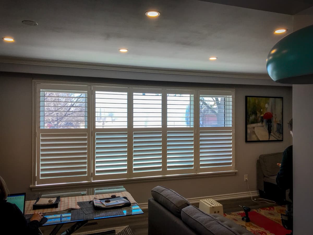California shutters on double window - Canadian Shutters Toronto